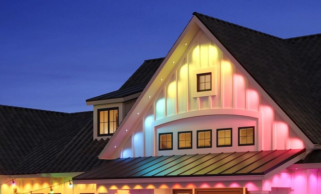 Roof with Permanent Outdoor Lights installed and illuminated with a rainbow pattern.